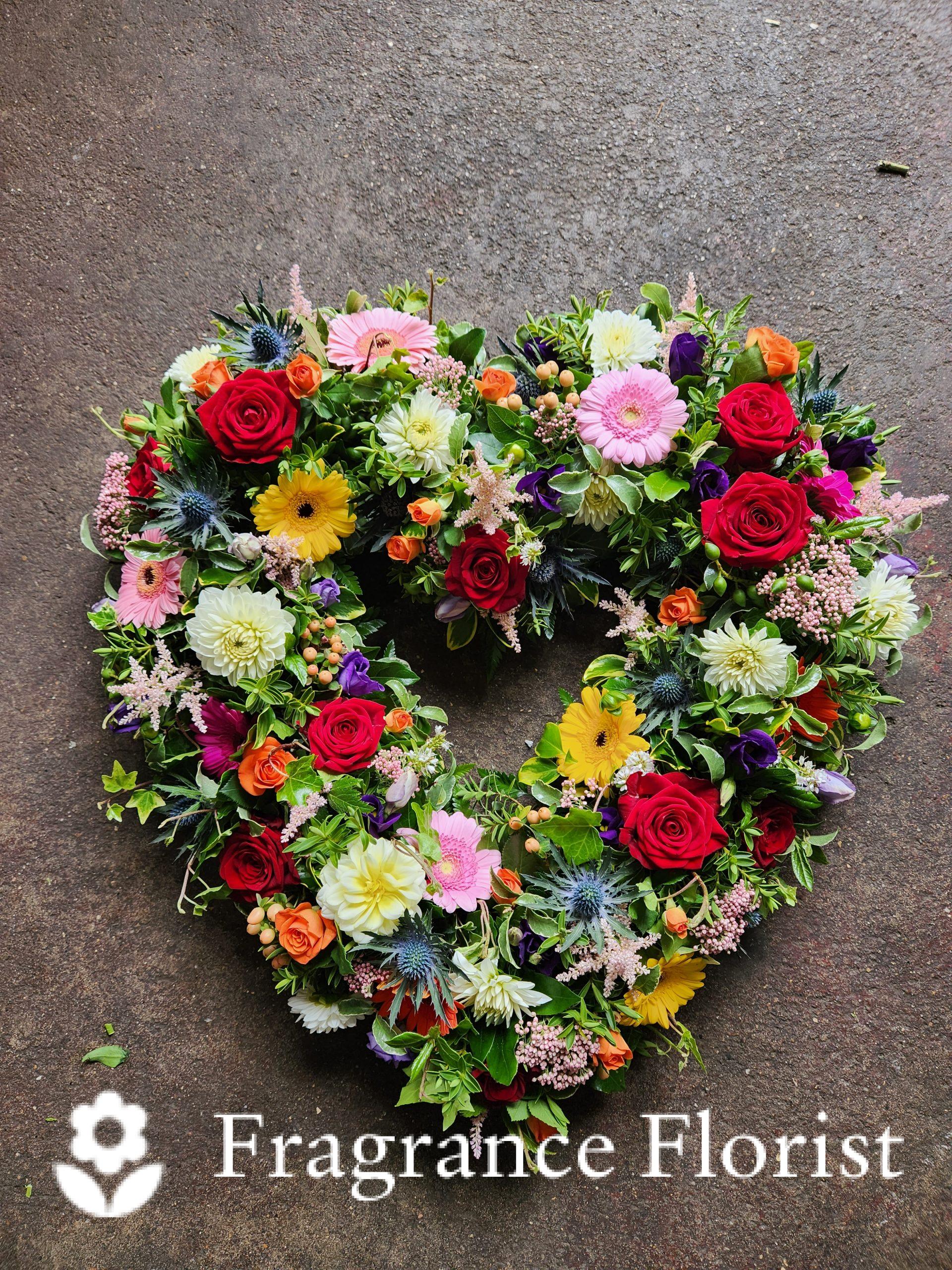 beautiful open heart made with seasonal cottage flowers